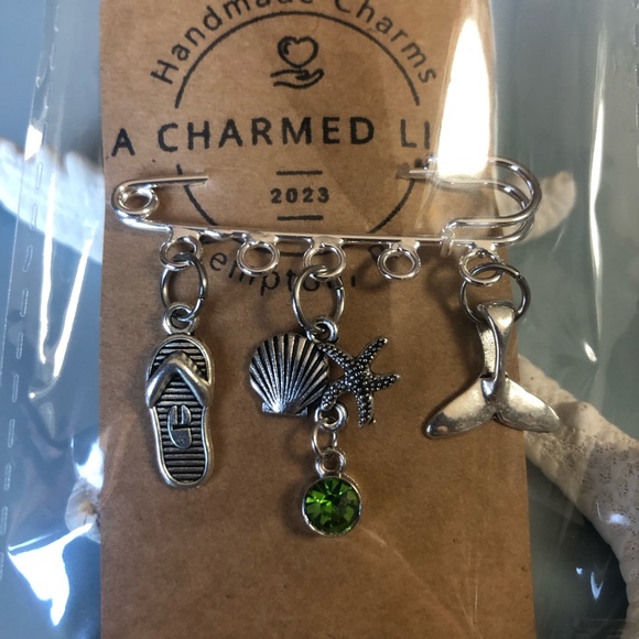 A Charm d Life Other - NWT, Handmade by A Charmed Life. Silver Pin with Ocean Themed Silver Charms.